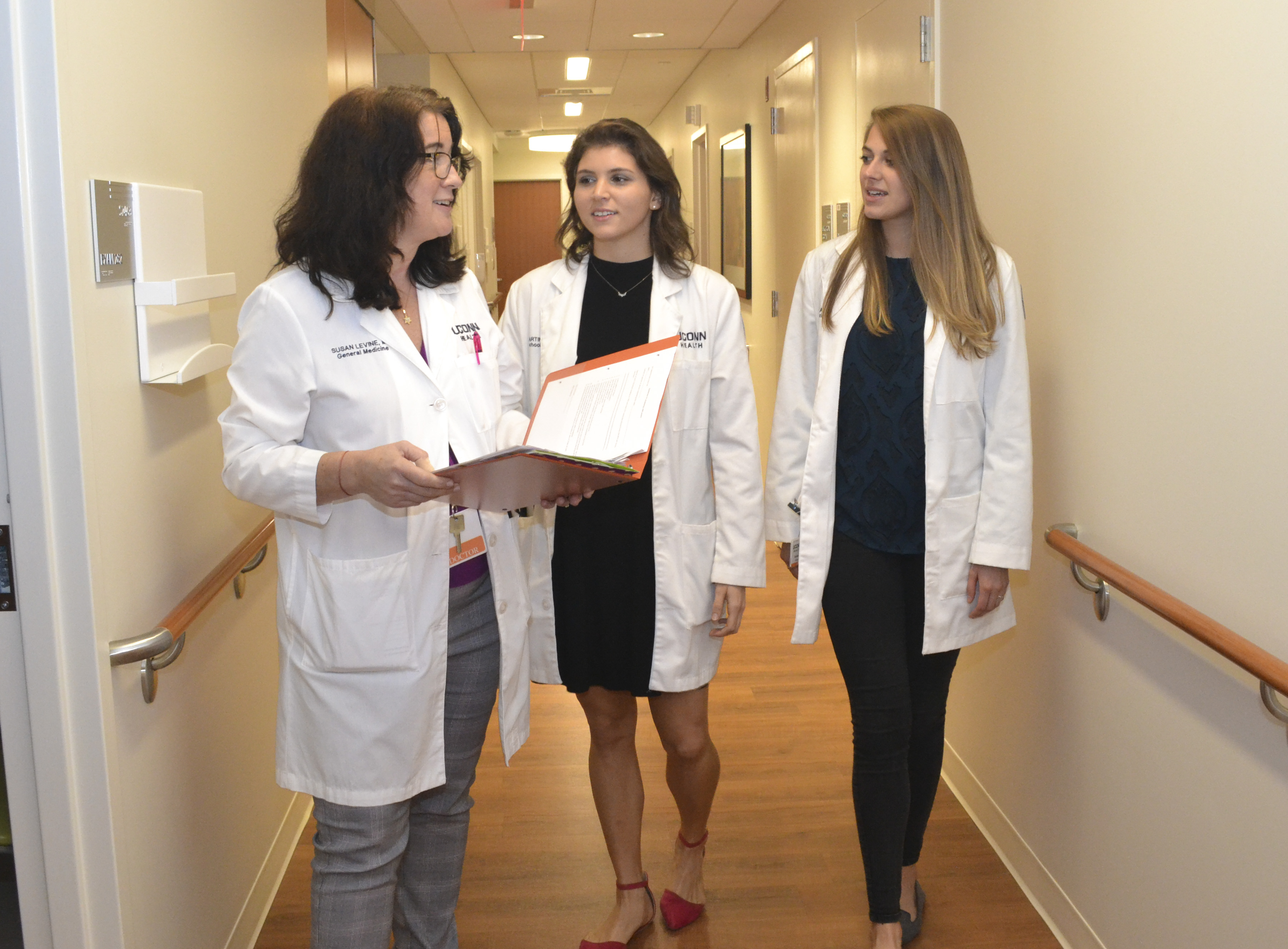 Former medical students with Dr. Susan Levine.