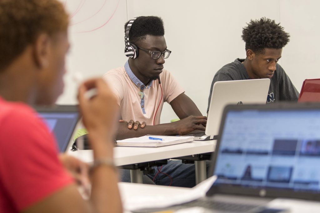 Stephen Sam ‘19 9 p.m. Studying with peers in ScHOLA²RS House Learning Community in Next Gen Hall. (Sean Flynn/UConn Photo)