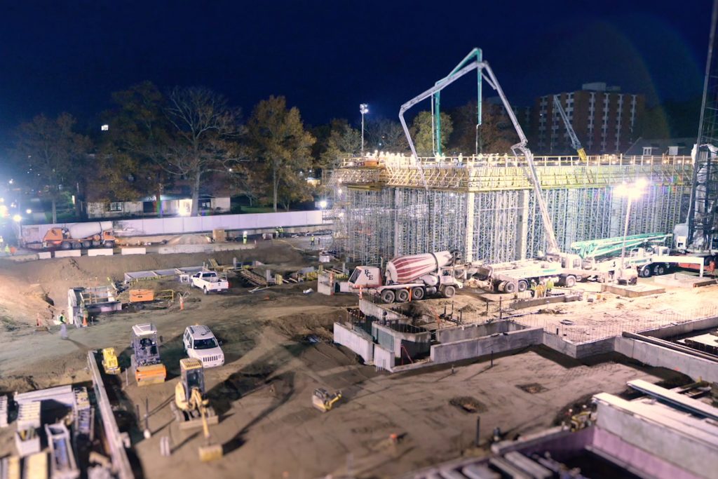 A steady procession of 75 trucks loaded with concrete began at 4 a.m. on Nov. 8, to pour the site of the swimming pool at UConn’s new Student Recreation Center. (Bret Eckhardt/UConn Photo)