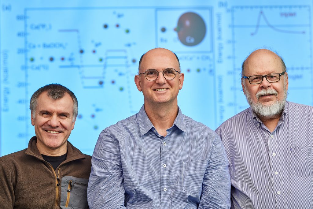 Ionel Simbotin, left, a postdoctoral fellow, Robin Côté, associate dean and professor of physics, and John Montgomery Jr., research professor. (Peter Morenus/UConn Photo)