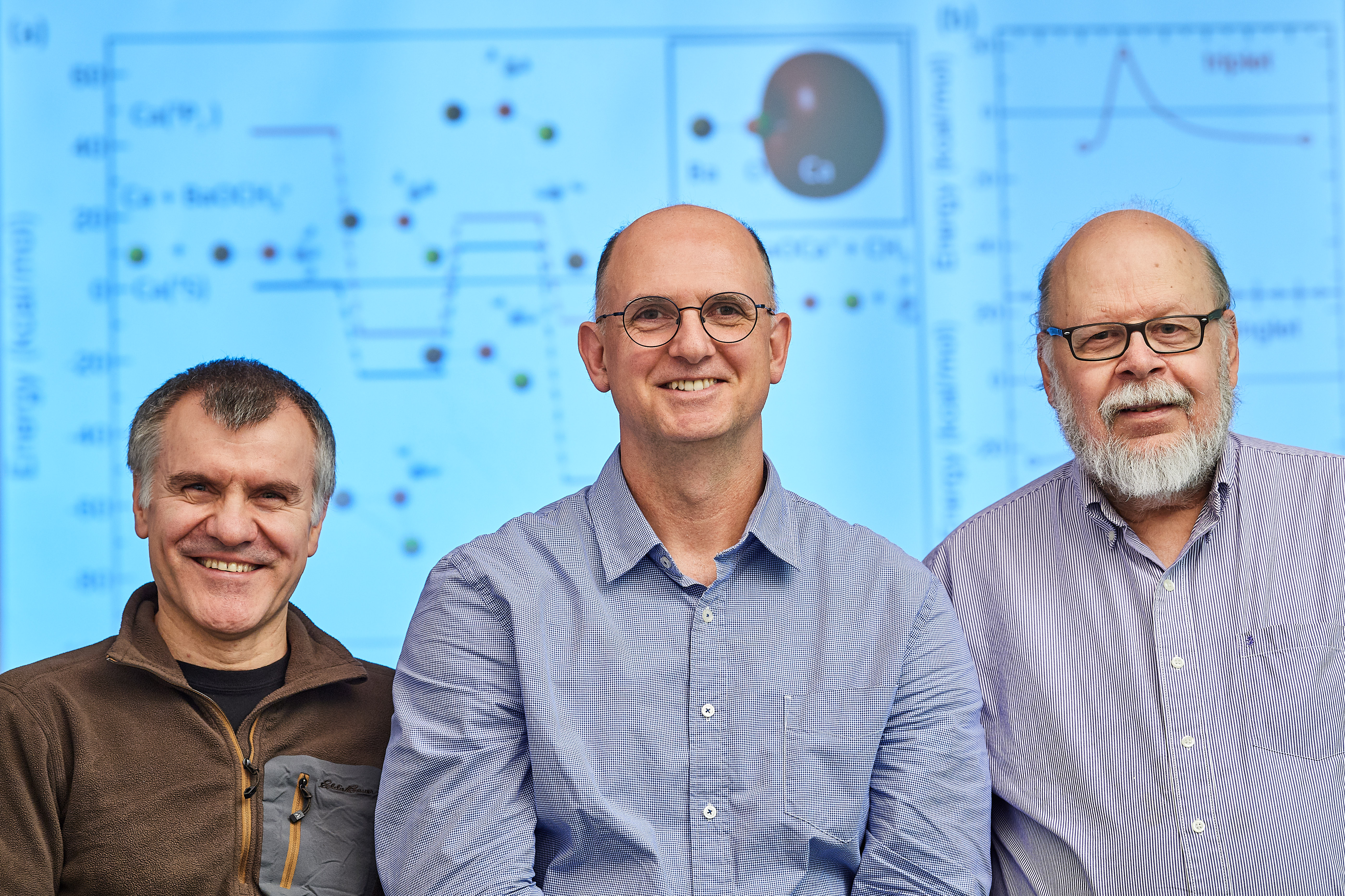 Ionel Simbotin, left, a postdoctoral fellow, Robin Côté, associate dean and professor of physics, and John Montgomery Jr., research professor. (Peter Morenus/UConn Photo)