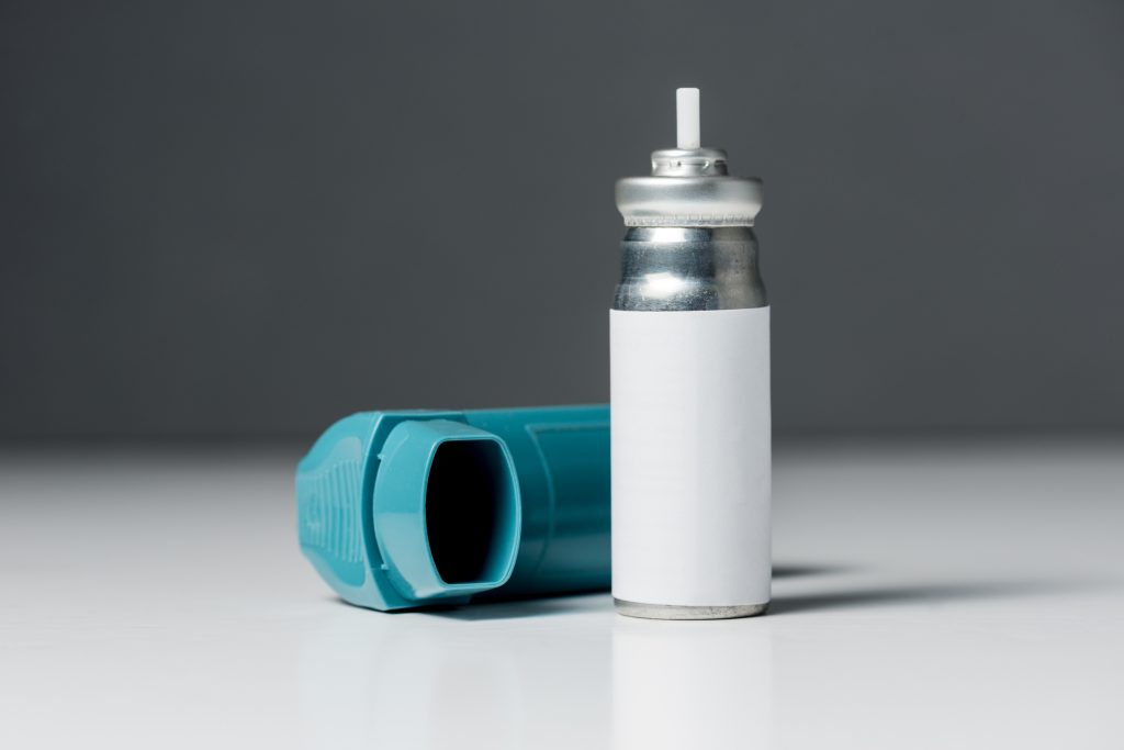 Asthma inhaler and a pressurised gas cannister refill. (Getty Image)