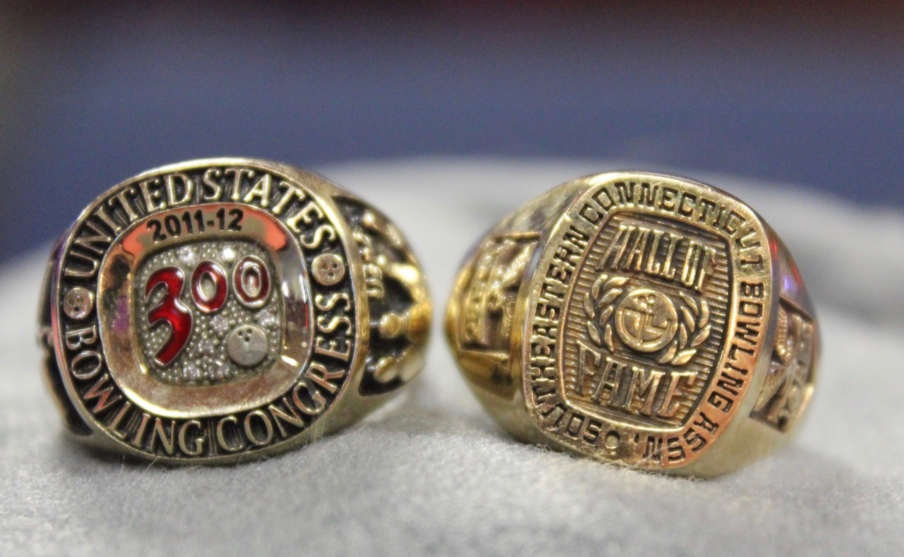 Rings signifying one of Chung's perfect games and his induction into the Southeastern Connecticut Bowling Hall of Fame. (Sheila Foran/UConn Photo)