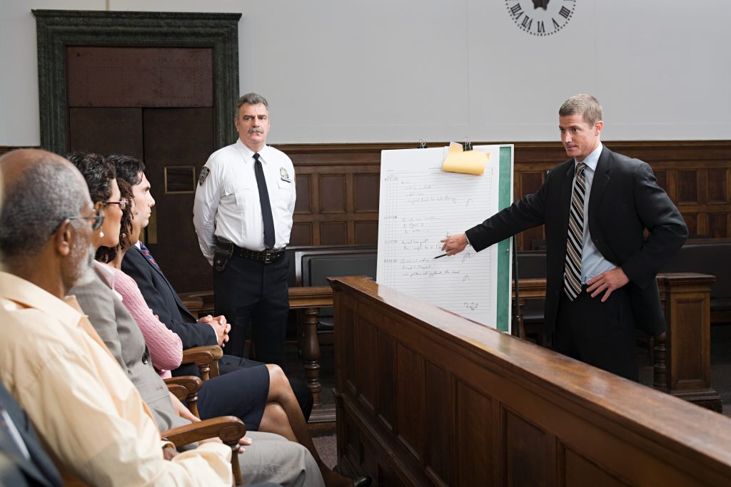 A lawyer and the jury. (Getty Images)