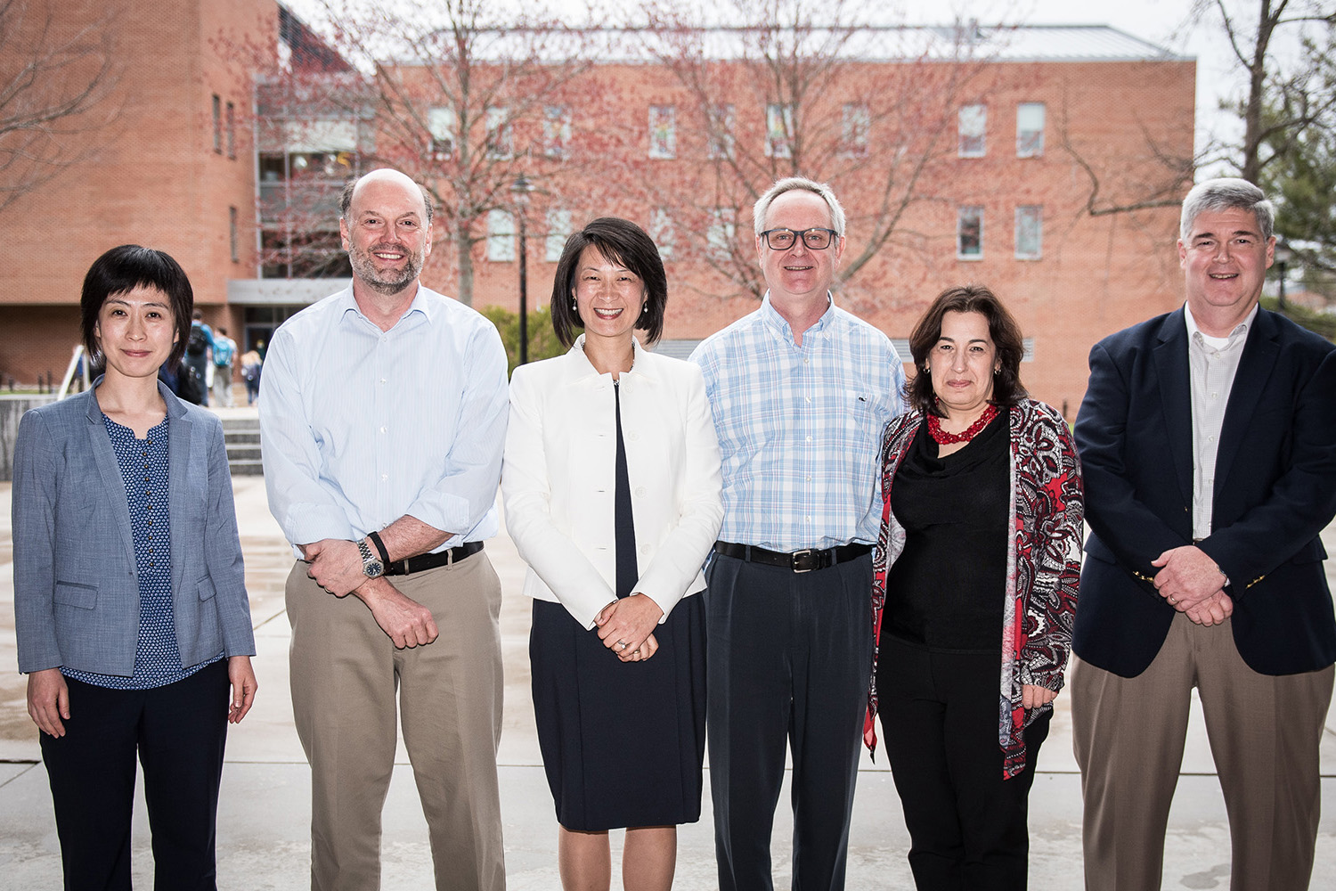 From left: Faculty award winners Xinxin Li, John Mathieu, Sulin Ba, Jan Stallaert, Nora Madjar, and David Papandria. (Nathan Oldham/UConn School of Business)