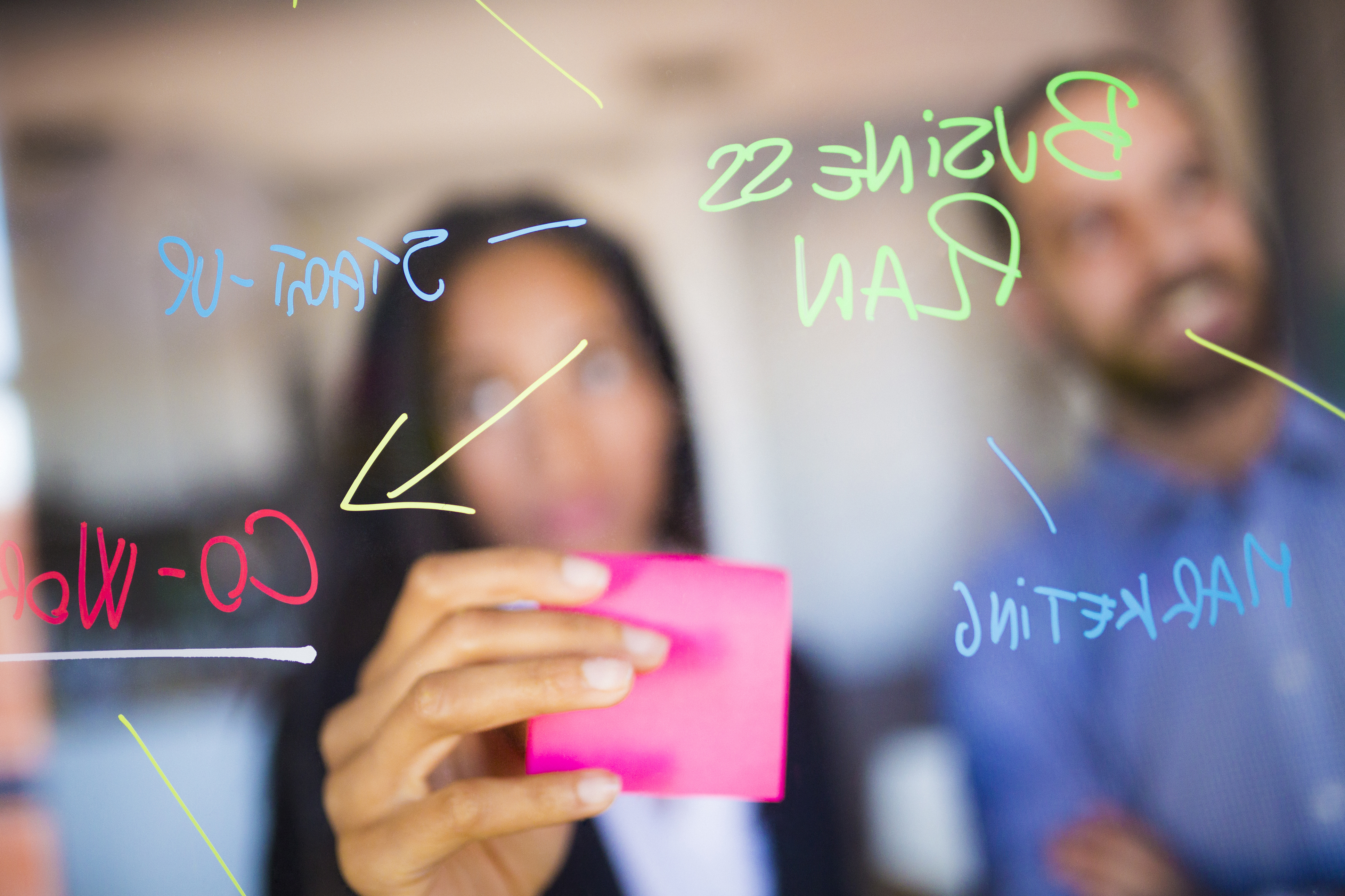 Woman and man brainstorming start-up ideas. (Getty Images)