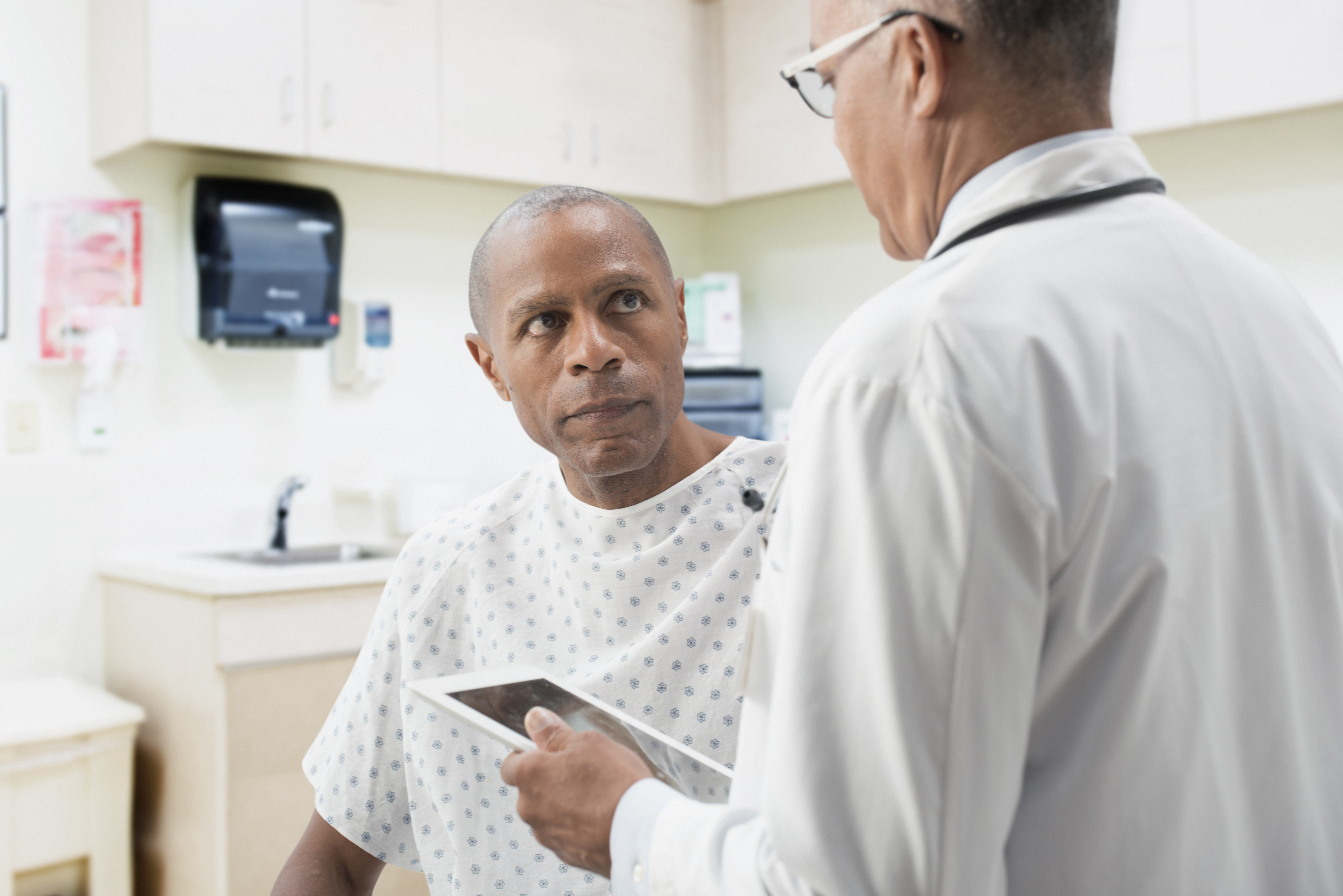 A doctor talking to a patient.