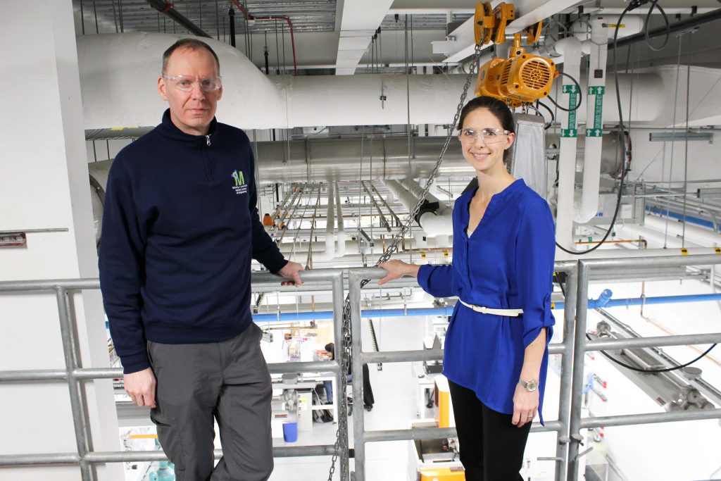 Professors Rainer Hebert and Lesley Frame stand in UConn Tech Park