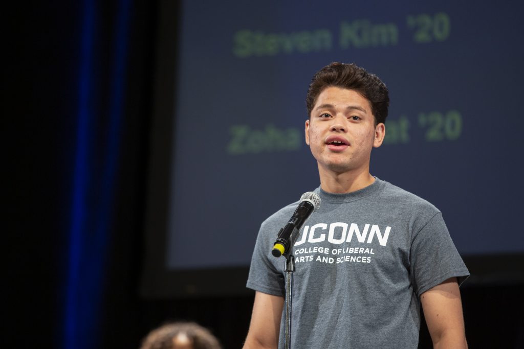 Michael Hernandez, above, addresses a crowd during UConn’s Week of Welcome in Jorgensen Auditorium on August 25, 2019. (Bri Diaz/UConn Photo)