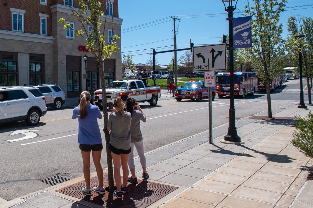 Onlookers watch the appreciation parade for the dedicated UConn health care providers treating members of the UConn community on May 05, 2020.