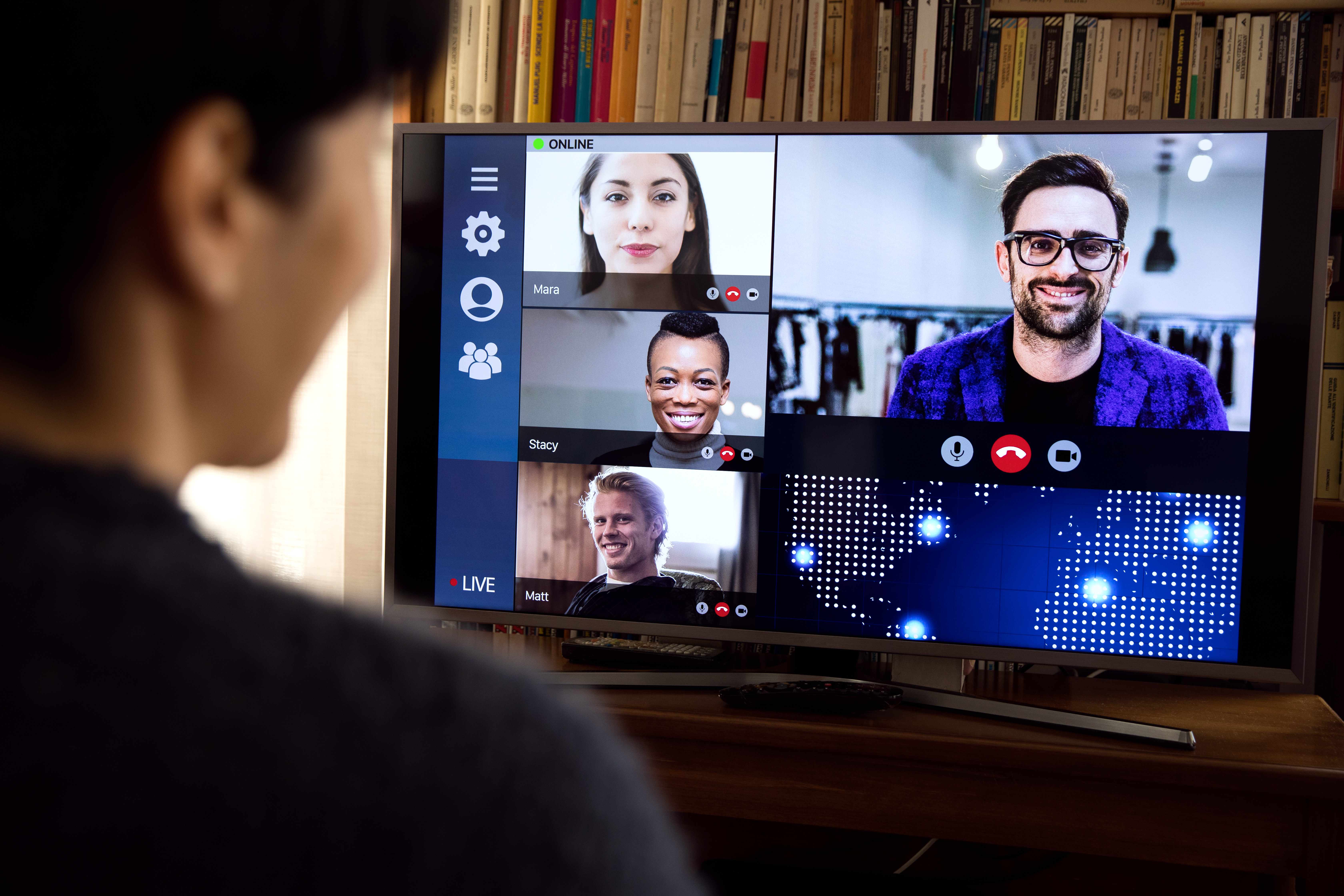 Woman in front of a device screen in video conference for work