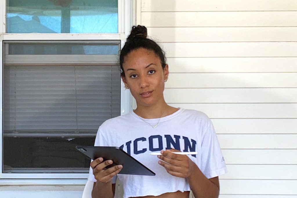 Aquia Providence '21 (CLAS) works on her geoscience data entry from her family's beach home in Clinton, CT.