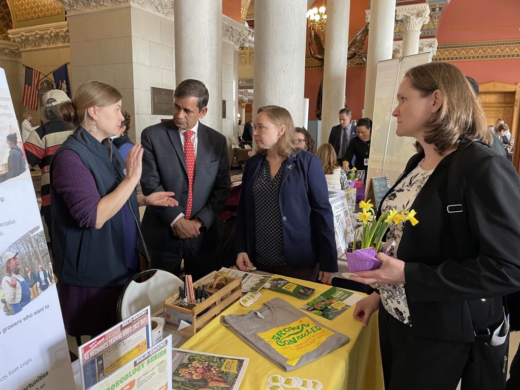 People chat at event