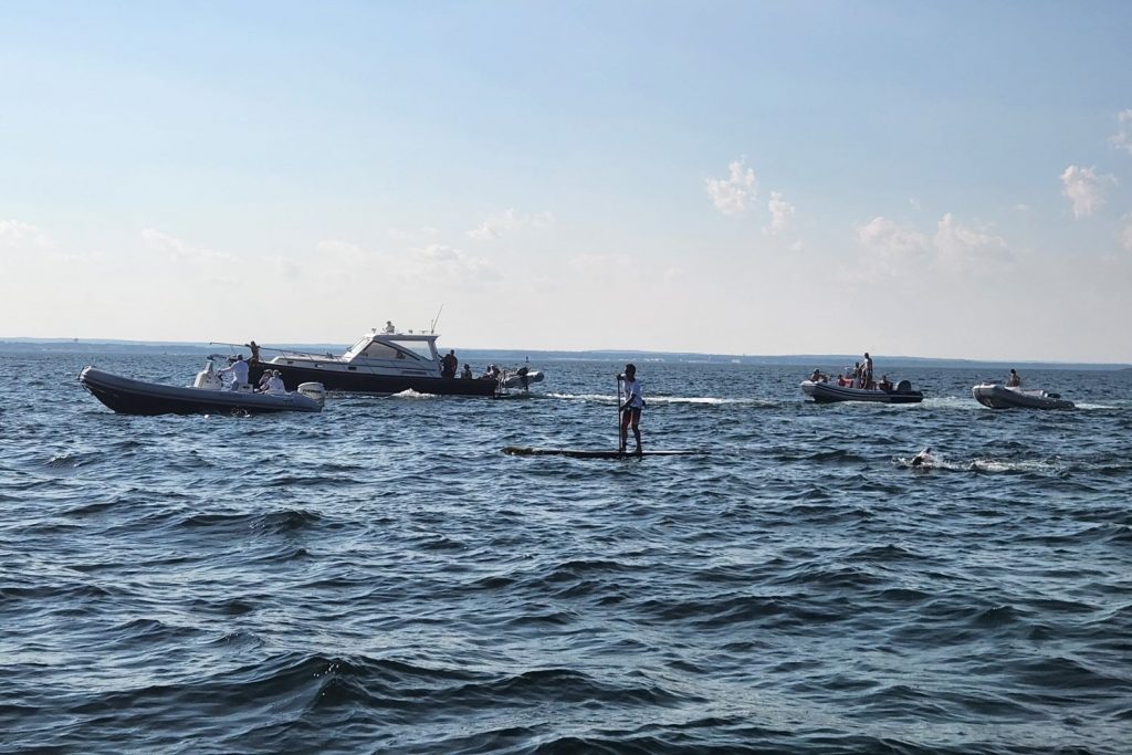 Swimmer and boats