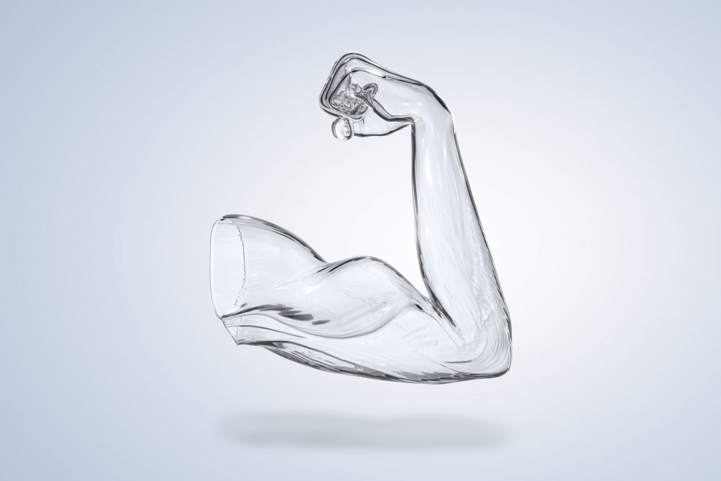 A muscular arm made of glass, flexing.