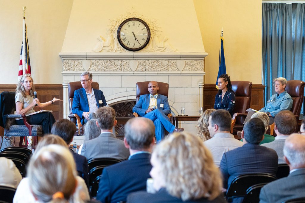 UConn Law roundtable participants on stage in the Reading Room