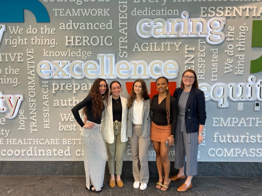 Members of the HealthWerx team at Hartford HealthCare’s Pearl Street Office on June 2, 2023, in Hartford. From left: Genesis Rosario '24 (CAHNR), Brenda Lituma Solis '23 (CAHNR) '25 MS, Sophia Manos '24 (CLAS), Jewel Booker '25 (CLAS), and Zoey England '22 (CLAS).