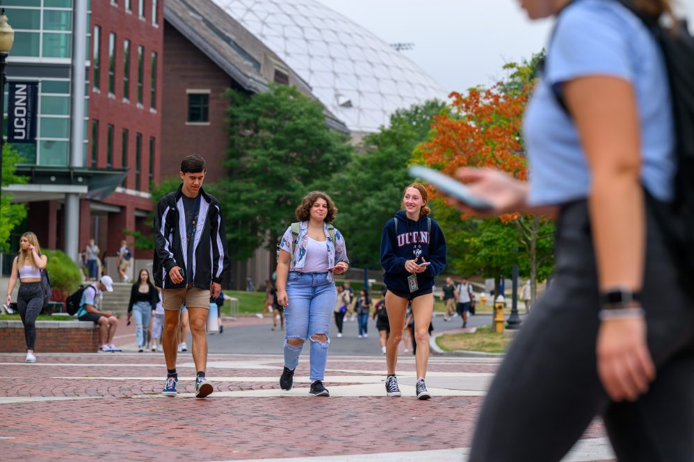 Students walk along Fairfield Way before 9 a.m. classes.