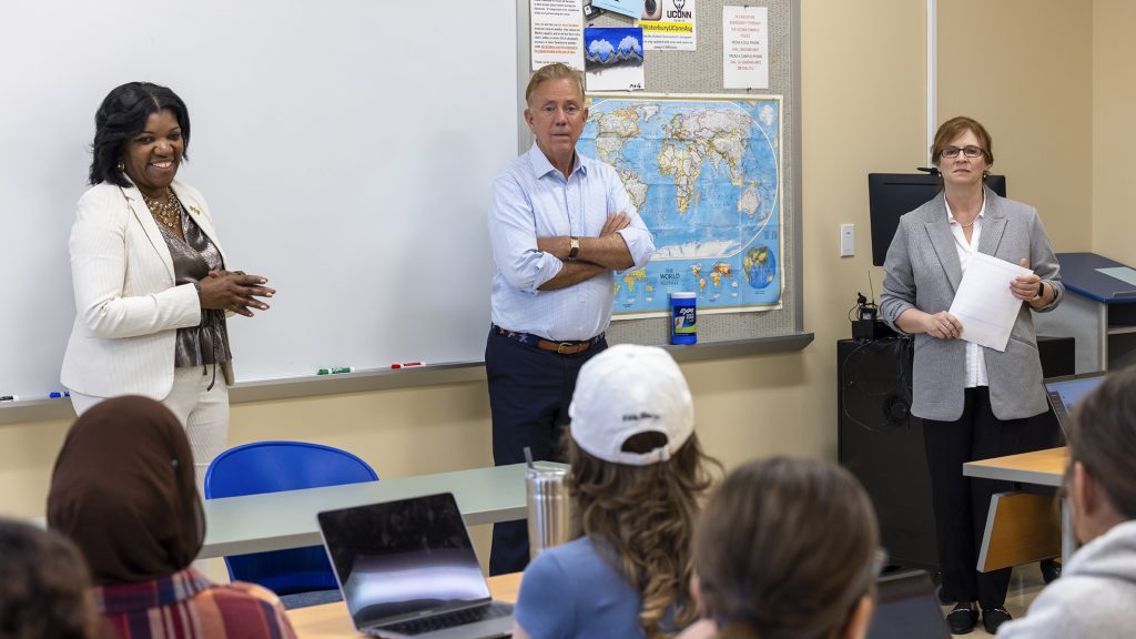 Governor Ned Lamont addresses a class of UConn Waterbury students.