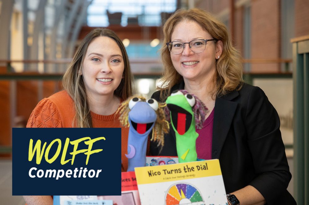 Emily Wicks (left) and Sandra Chafouleas pose with some of their puppets and materials from Feel Your Best Self.