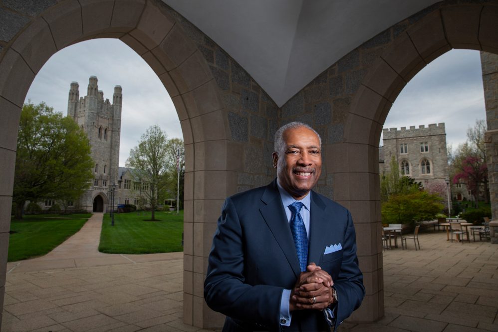 Curtis Tearte stands in the entrance to the UConn Law Library