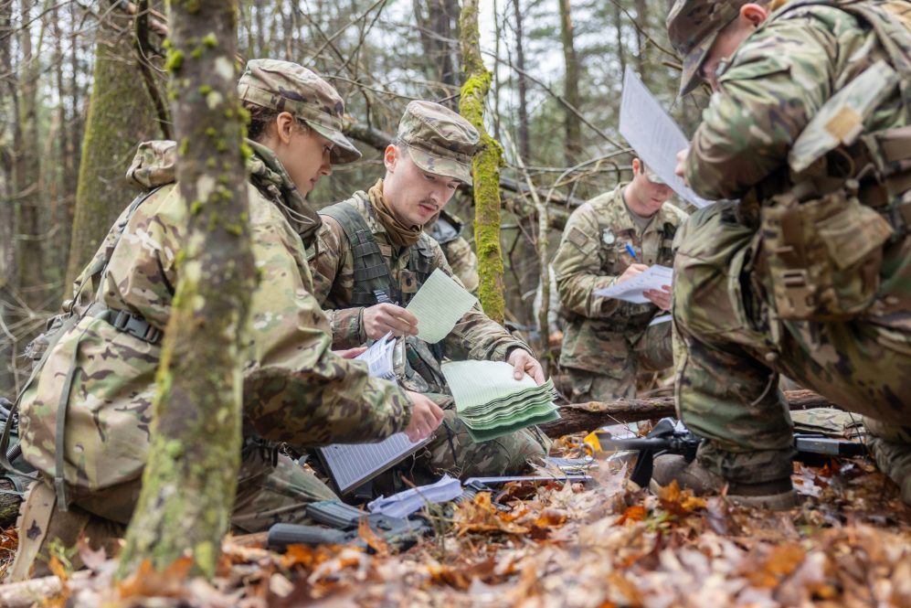 Army ROTC cadets work during an exercise on the second day of the Combined Field Training Exercise (CFTX) at Fort Devens.