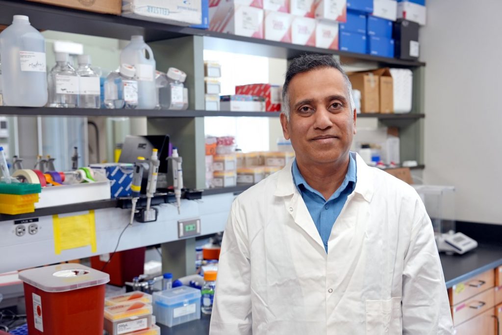 Clinton Mathias in his lab in the Jones Building. (Jason Sheldon/UConn Photo)