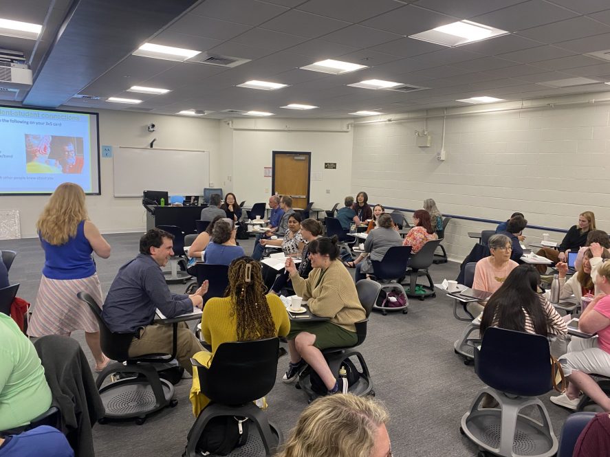 Students, faculty, and staff together at a conference.