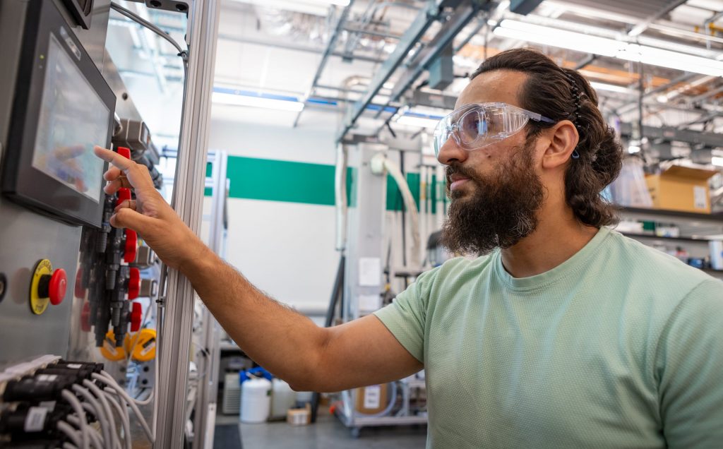 Usama Sheikh in a laboratory.