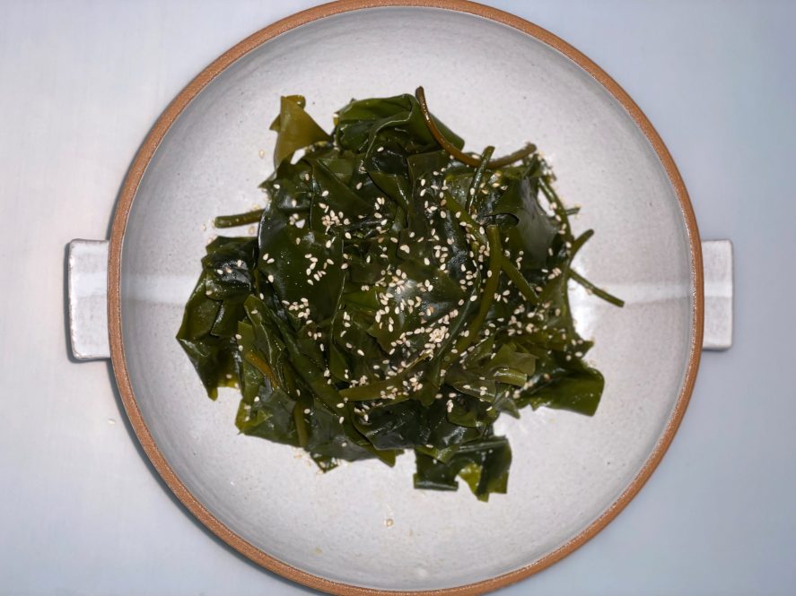 A plate of sugar kelp prepared for a meal.