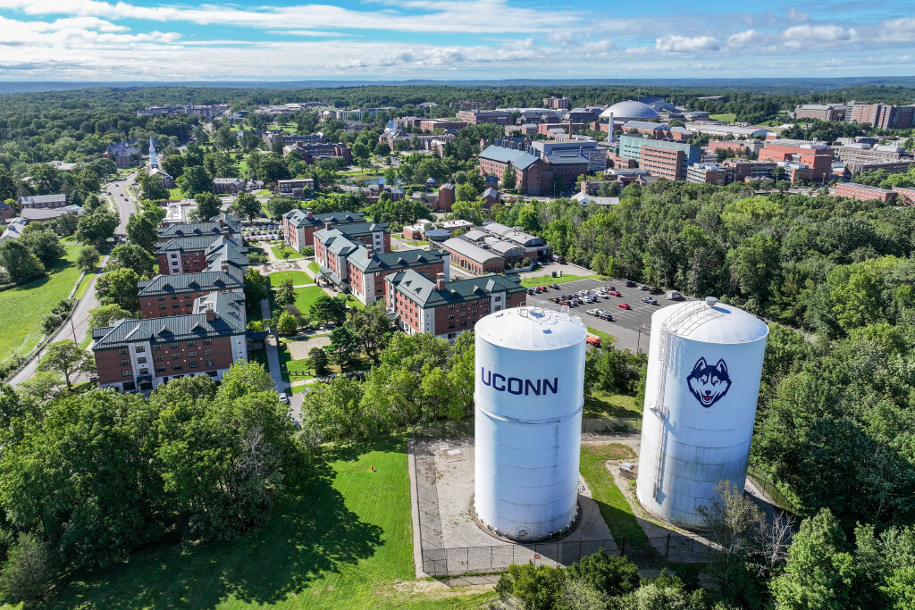 An aerial view of campus from the north on a sunny day in Storrs on Aug. 20, 2024. (Sydney Herdle/UConn Photo)