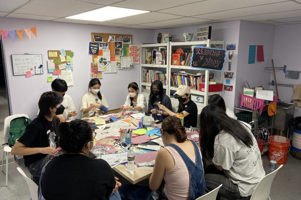 Students working on a quilt-making activity at the W.O.W. Project in Manhattan's Chinatown.