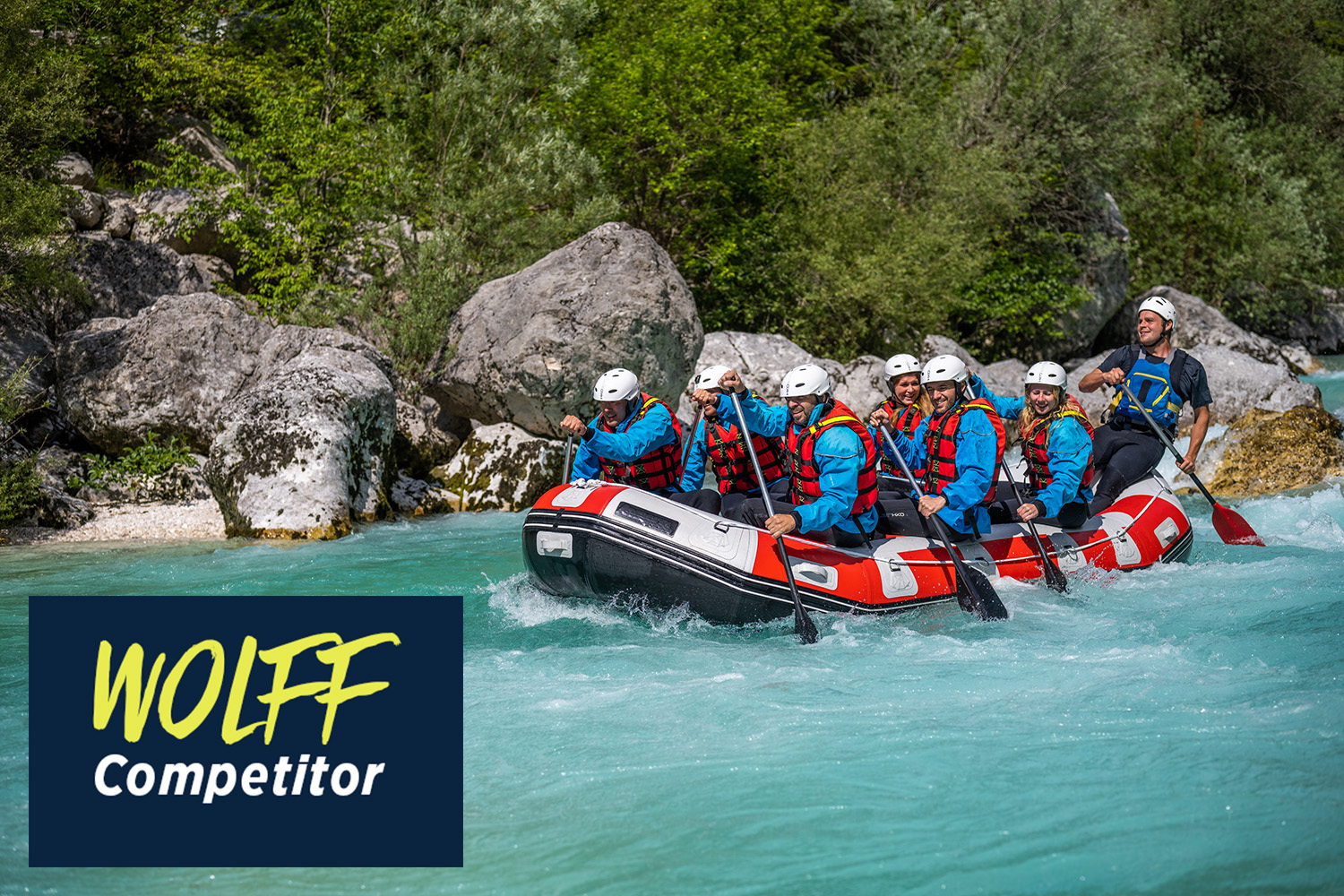 A group of people in a raft on a raging river.