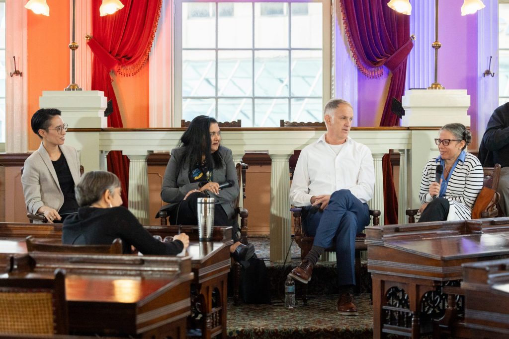 From left, moderator Catherine Shen and panelists Manisha Sinha, Christopher Vials, and Evelyn Simien.