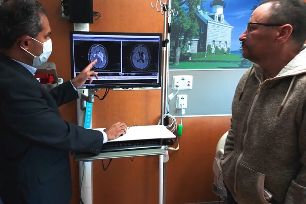 Steffan Goelitzer discussing his diagnosis with his doctor at UConn Health