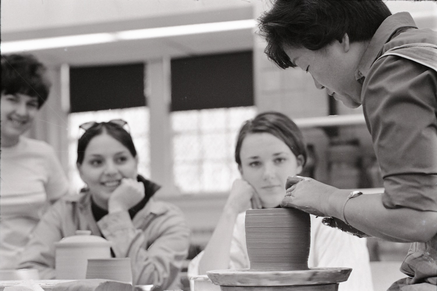 Minnie Negoro demonstrates using the potter's wheel during a ceramics course on December 5, 1967. 