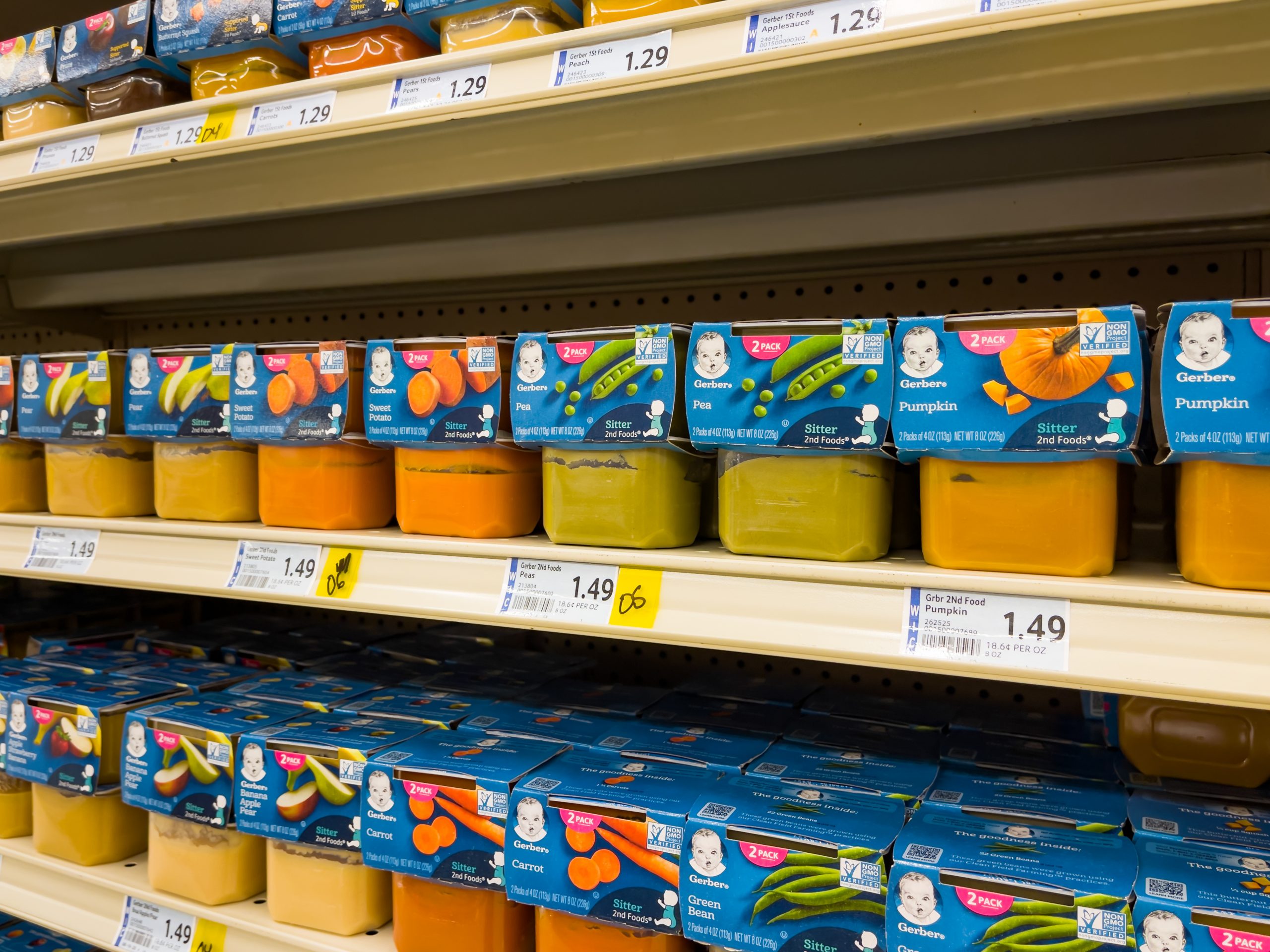 A supermarket aisle with baby food.