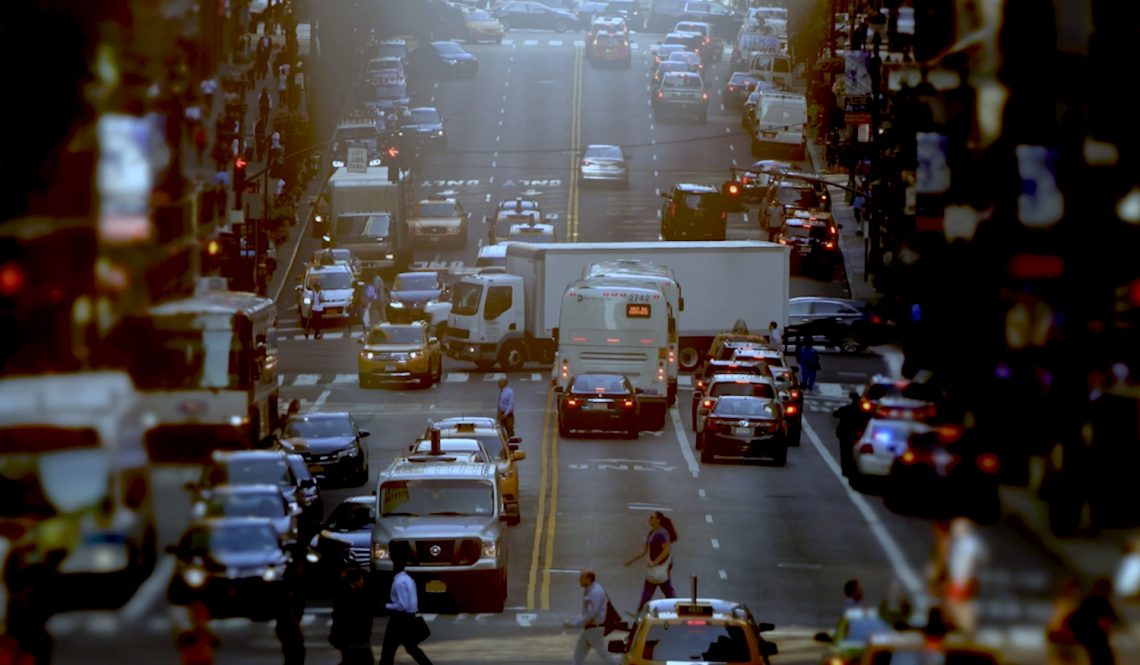 Busy city street full of traffic